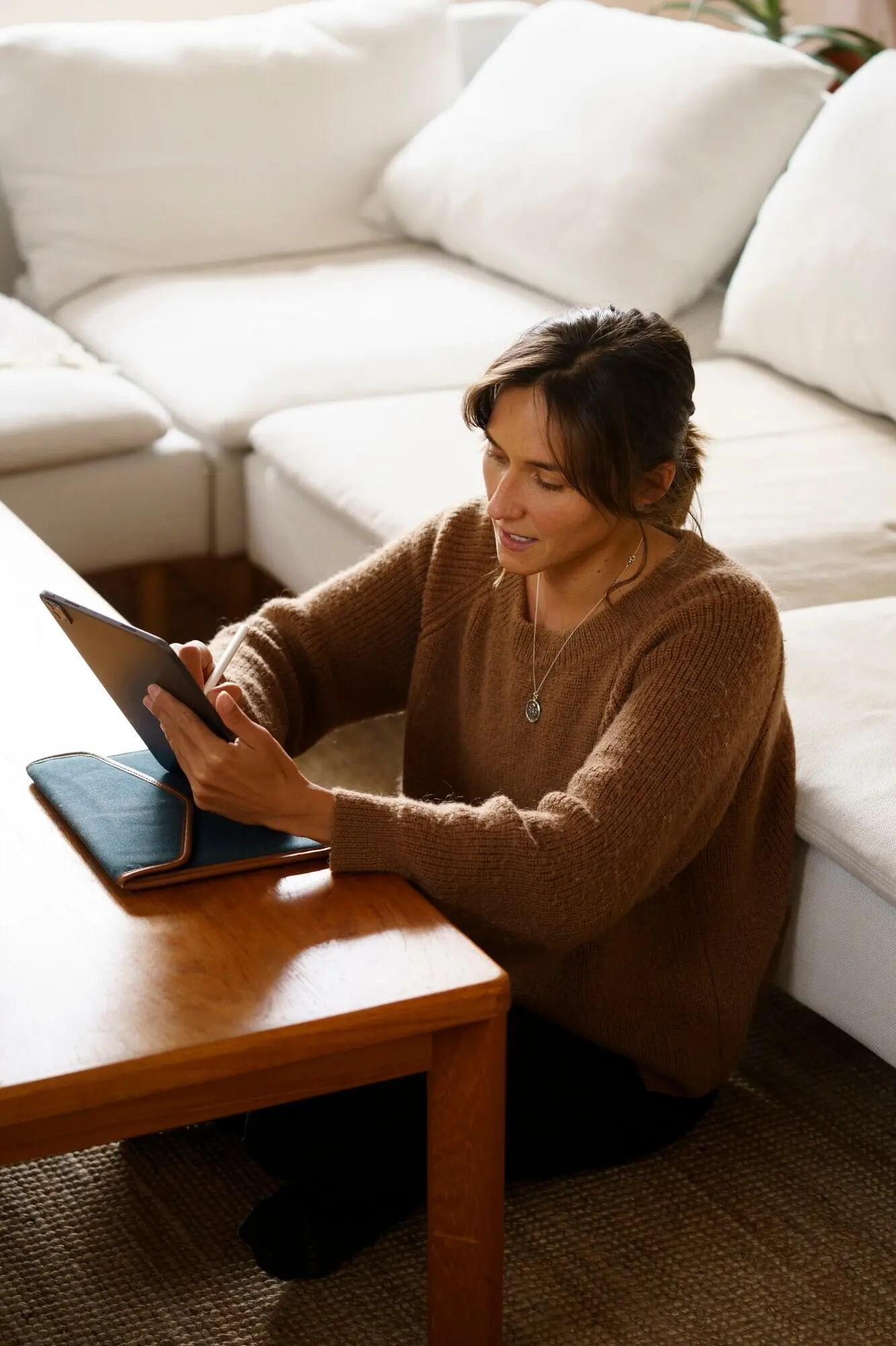 A woman utilizing digital tablet technology
