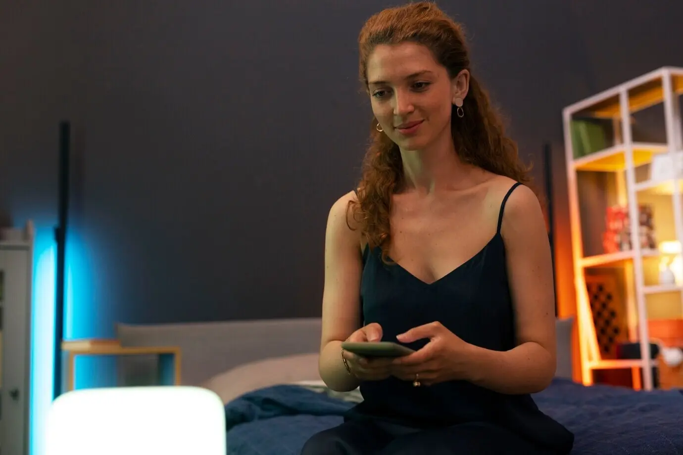 A medium shot showing a woman spending time at home.